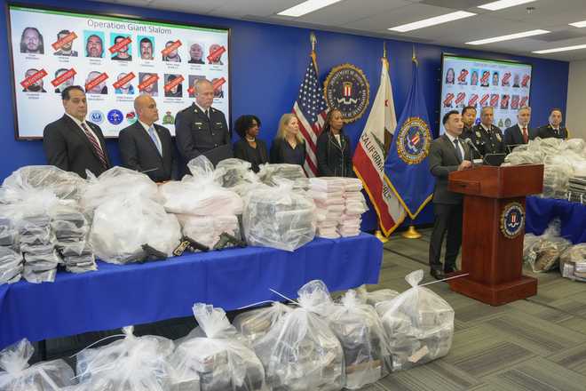 United&#x20;States&#x20;Attorney&#x20;Martin&#x20;Estrada,&#x20;right&#x20;at&#x20;podium,&#x20;&#x20;joined&#x20;by&#x20;federal,&#x20;local,&#x20;and&#x20;international&#x20;officials,&#x20;announces&#x20;federal&#x20;charges&#x20;and&#x20;arrests&#x20;of&#x20;alleged&#x20;members&#x20;of&#x20;a&#x20;transnational&#x20;drug&#x20;trafficking&#x20;operation&#x20;that&#x20;routinely&#x20;shipped&#x20;hundreds&#x20;of&#x20;kilograms&#x20;of&#x20;cocaine&#x20;from&#x20;Colombia,&#x20;through&#x20;Mexico&#x20;and&#x20;Southern&#x20;California,&#x20;to&#x20;Canada&#x20;and&#x20;other&#x20;locations&#x20;in&#x20;the&#x20;United&#x20;States,&#x20;during&#x20;a&#x20;news&#x20;conference&#x20;at&#x20;the&#x20;FBI&#x20;offices&#x20;in&#x20;Los&#x20;Angeles,&#x20;Thursday,&#x20;Oct.&#x20;17,&#x20;2024.&#x20;&#x28;AP&#x20;Photo&#x2F;Damian&#x20;Dovarganes&#x29;