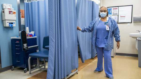 FILE - A nurse works at the El Nuevo San Juan Health Center at the Bronx borough in New York on Jan. 11, 2024. (AP Photo/Eduardo Munoz Alvarez, File)