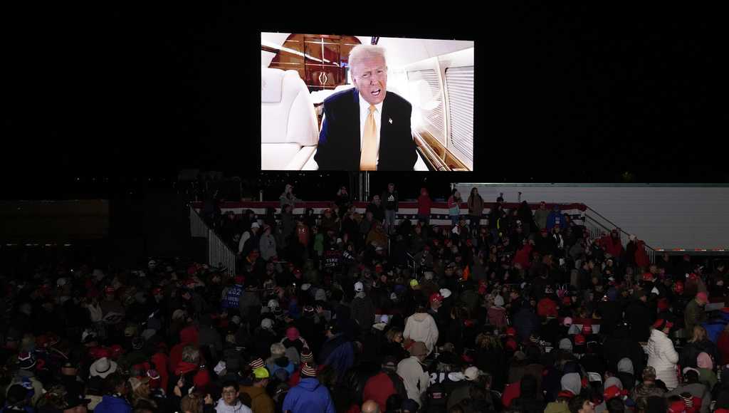 Donald Trump was running hours late to a rally in Michigan, leading