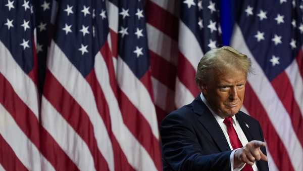 Republican presidential nominee former President Donald Trump points to the crowd at an election night watch party, Wednesday, Nov. 6, 2024, in West Palm Beach, Fla.