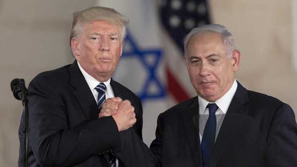 FILE – President Donald Trump and Israeli Prime Minister Benjamin Netanyahu shake hands at the Israel museum in Jerusalem, Tuesday, May 23, 2017. (AP Photo/Sebastian Scheiner, File)