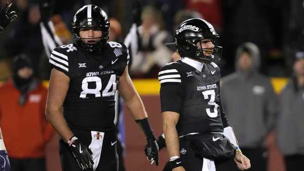 Iowa State quarterback Rocco Becht (3) celebrates after a 5-yard touchdown run during the first half of an NCAA college football game against Kansas State, Saturday, Nov. 30, 2024, in Ames, Iowa. (AP Photo/Charlie Neibergall)