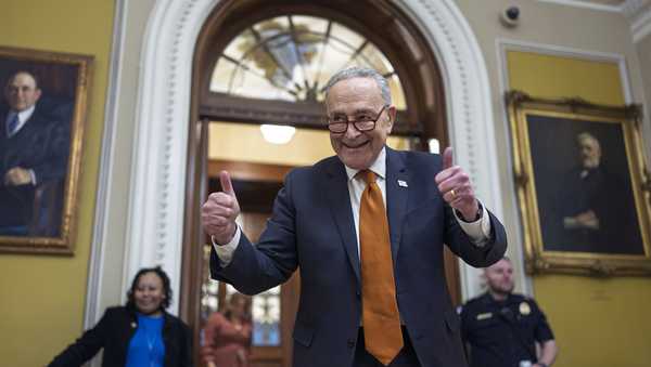 Senate Majority Leader Chuck Schumer, D-N.Y., celebrates as the Senate begins voting on the government funding bill just in time to meet the midnight deadline, at the Capitol in Washington, Friday, Dec. 20, 2024. (AP Photo/J. Scott Applewhite)