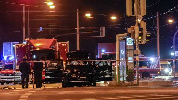 The car that was crashed into a crowd of people at the Magdeburg Christmas market is seen following the attack in Magdeburg, Germany, Saturday early morning, Dec. 21, 2024. (AP Photo/Ebrahim Noroozi)