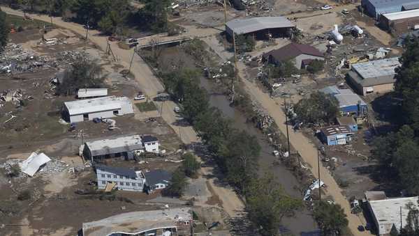 FILE - Damage from Hurricane Helene near Asheville, N.C., is seen during an aerial tour for President Joe Biden, Oct. 2, 2024. (AP Photo/Susan Walsh, File)