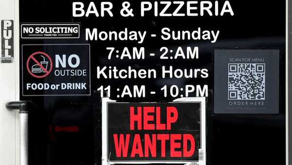 FILE - A help wanted sign is displayed at a restaurant in Chicago, Ill., Nov. 25, 2024. (AP Photo/Nam Y. Huh, File)