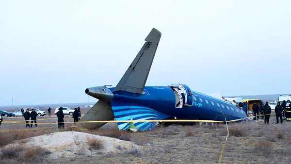 In this photo taken from a video released by the administration of Mangystau region, a part of Azerbaijan Airlines' Embraer 190 lies on the ground near the airport of Aktau, Kazakhstan, on Thursday, Dec. 26, 2024. (The Administration of Mangystau Region via AP)