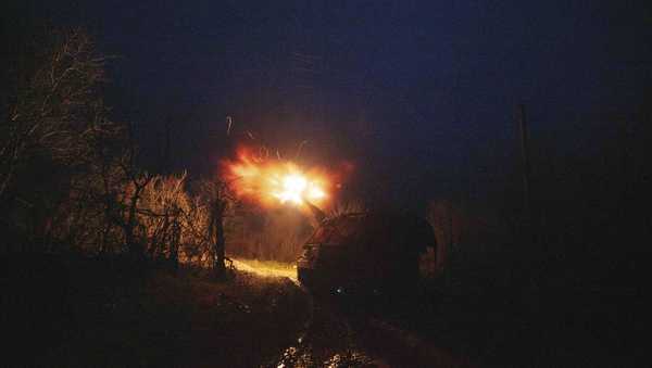 A Ukrainian AS-90 self-propelled artillery vehicle fires towards Russian positions at the frontline on Pokrovsk direction, Donetsk region, Ukraine, Wednesday, Dec. 23, 2024. (AP Photo/Evgeniy Maloletka)