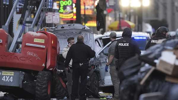 Emergency services attend the scene on Bourbon Street after a vehicle drove into a crowd on New Orleans' Canal and Bourbon Street, Wednesday Jan. 1, 2025.