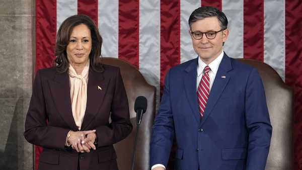 Vice President Kamala Harris stands with House Speaker Mike Johnson of La., as a joint session of Congress convenes to confirm the Electoral College votes, affirming President-elect Donald Trump's victory in the presidential election, Monday, Jan. 6, 2025, at the U.S. Capitol in Washington. (AP Photo/Matt Rourke)