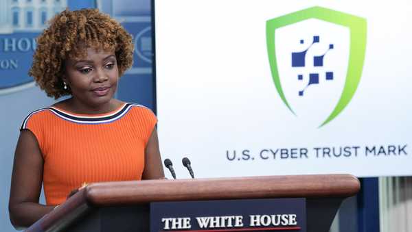 FILE - White House press secretary Karine Jean-Pierre talks about a cybersecurity certification and labeling program at the White House in Washington, July 18, 2023. The federal government is rolling out a consumer labeling system designed to help Americans pick smart devices that are less vulnerable to hacking.  Under the voluntary program, called the U.S. Cyber Trust Mark Initiative, manufacturers can affix the label on their products if they meet federal cybersecurity standards.  (AP Photo/Susan Walsh, File)