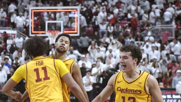 Iowa State's forward Kayden Fish (11) chest-bumps forward Joshua Jefferson, second from left, after their overtime win in an NCAA college basketball game against Texas Tech, Saturday, Jan. 11, 2025, in Lubbock, Texas. (AP Photo/Annie Rice)