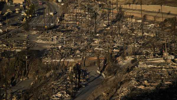 The Palisades Fire leaves total devastation in the Pacific Palisades neighborhood of Los Angeles, Monday, Jan. 13, 2025. (AP Photo/John Locher)