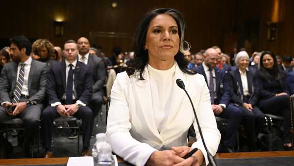 Tulsi Gabbard, President Donald Trump's choice to be the Director of National Intelligence, arrives to appear before the Senate Intelligence Committee for her confirmation hearing on Capitol Hill Thursday, Jan. 30, 2025, in Washington. (AP Photo/John McDonnell)