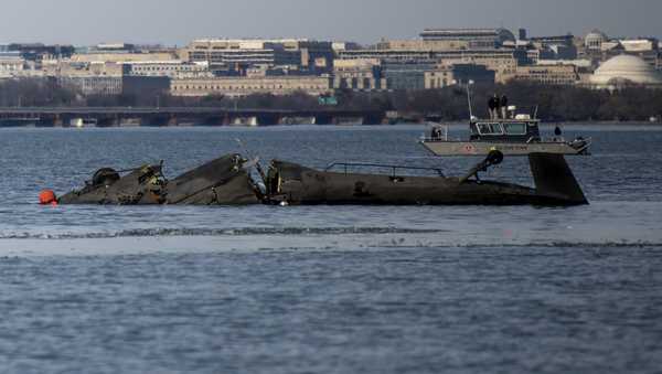 In this image provided by the U.S. Coast Guard, wreckage is seen in the Potomac River near Ronald Reagan Washington National Airport, Thursday, Jan. 30, 2025 in Washington.