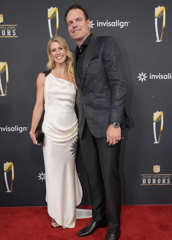 Minnesota Vikings coach Kevin O&apos;Connell and wife Leah O&apos;Connell, pose on the red carpet at the NFL Honors award show ahead of the Super Bowl 59 football game, Thursday, Feb. 6, 2025, in New Orleans. (AP Photo/Gerald Herbert)