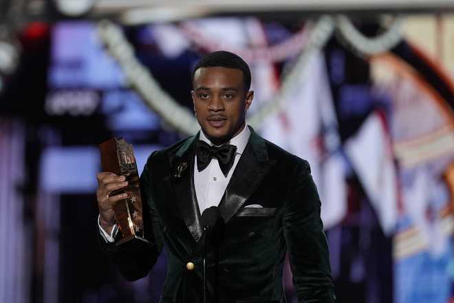 Denver Broncos&apos; Patrick Surtain II, AP Defensive Player of the year speaks during the NFL Honors award show ahead of the Super Bowl 59 football game, Thursday, Feb. 6, 2025, in New Orleans. (AP Photo/David J. Phillip)