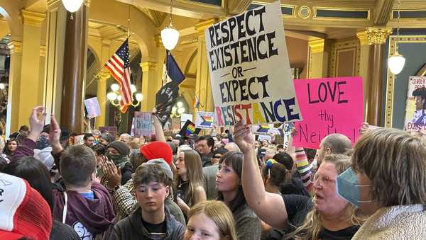 Protesters filled the Iowa state Capitol in Des Moines on Monday, Feb. 24, to denounce a bill that would strip the state civil rights code of protections based on gender identity. (AP Photo/Hannah Fingerhut)