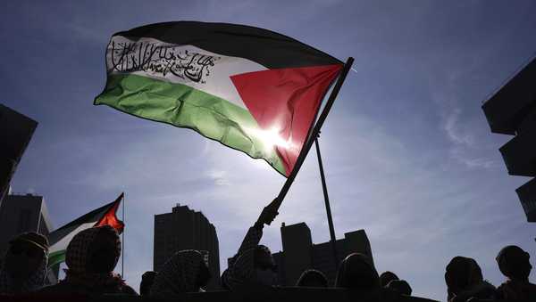 FILE - Protesters rally in support of detained Palestinian activist Mahmoud Khalil, March 14, 2025, in New York. (AP Photo/Jason DeCrow, File)