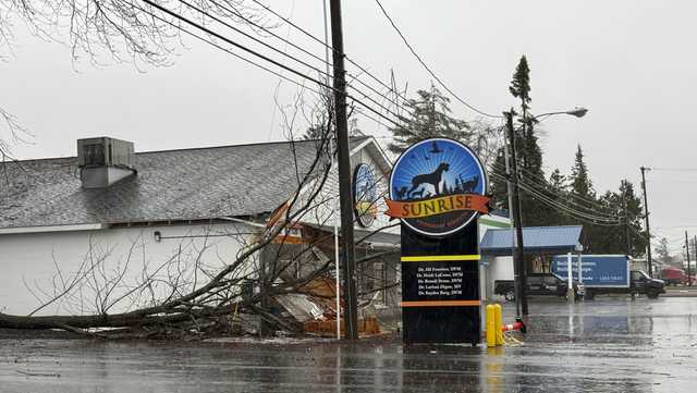 Freezing rain and power outages grip Great Lakes region