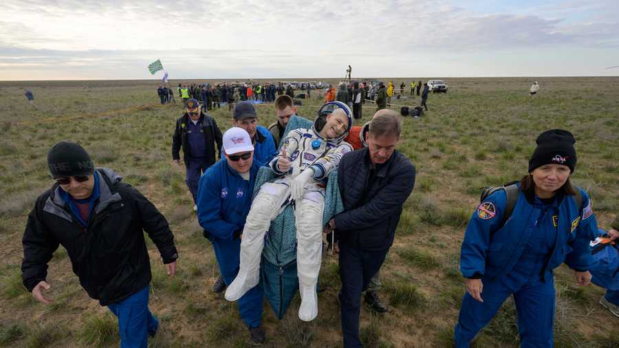 This image provided by NASA shows astronaut Don Pettit being carried to a medical tent shortly after he, and Roscosmos cosmonauts Alexey Ovchinin and Ivan Vagner landed in their Soyuz MS-26 spacecraft near the town of Zhezkazgan, Kazakhstan on Sunday, April 20, 2025. (Bill Ingalls/NASA via AP)