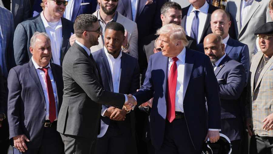President Donald Trump, right, shakes the hand of Philadelphia Eagles coach Nick Sirianni, as Trump welcomes the Super Bowl champion NFL football team to the South Lawn of the White House, Monday, April 28, 2025, in Washington. (AP Photo/Alex Brandon)