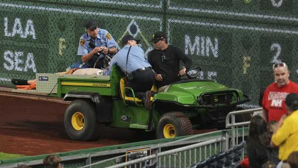 A fan is carted off the field at PNC Park after falling out of the stands during the seventh inning of a baseball game between the Pittsburgh Pirates and the Chicago Cubs in Pittsburgh, Wednesday, April 30, 2025.