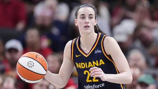 FILE -  Indiana Fever guard Caitlin Clark (22) plays against the Dallas Wings in the second half of a WNBA basketball game in Indianapolis, Sunday, Sept. 15, 2024. (AP Photo/Michael Conroy, File)