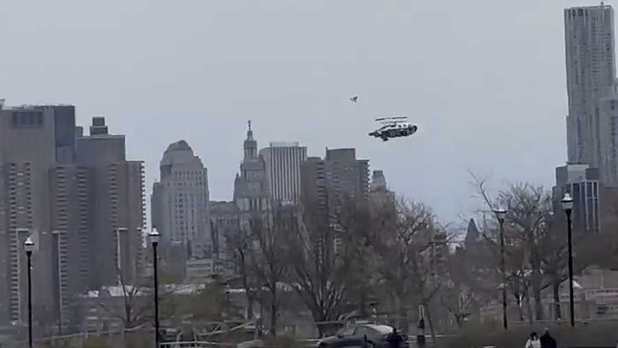 In this photo taken from video, a helicopter falls from the sky into the Hudson River , Thursday, April 10, 2025, in Jersey City, N.J. (Bruce Wall via AP)