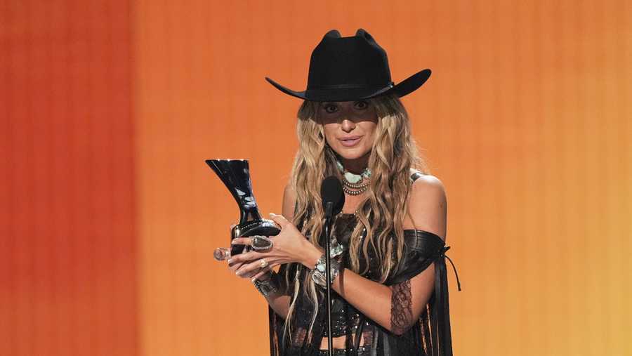 Lainey Wilson accepts the award for album of the year for &quot;Whirlwind&quot; during the 60th annual Academy of Country Music Awards on Thursday, May 8, 2025, in Frisco, Texas. (AP Photo/Chris Pizzello)