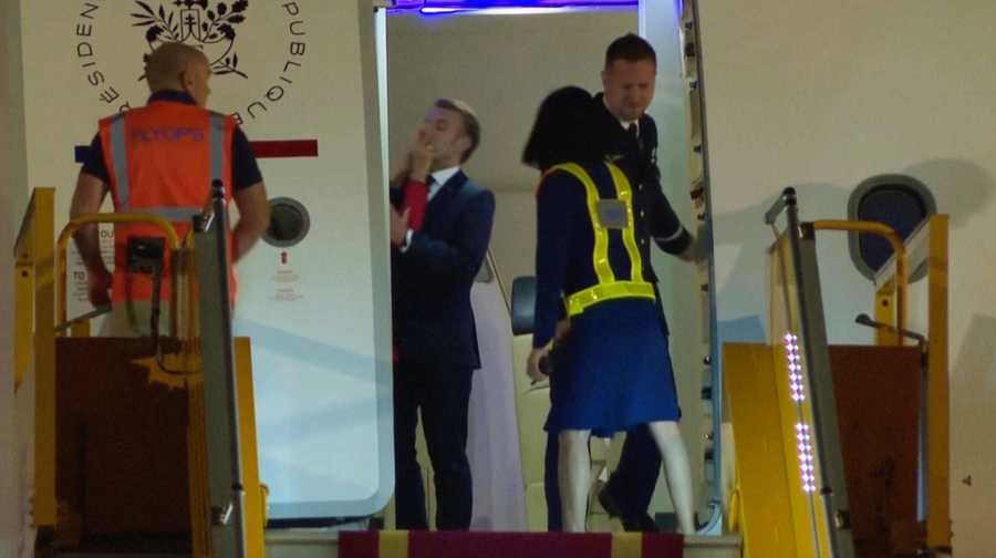 In this grab taken from video, France&apos;s President Emmanuel Macron prepares to disembark a plane on arrival, in Hanoi, Vietnam, Sunday, May 25, 2025. (AP Photo/Hau Dinh)