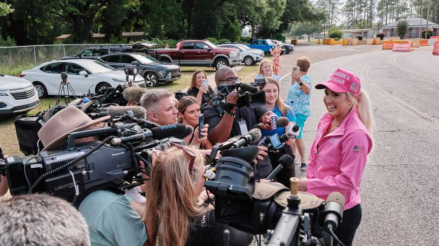 Savannah Chrisley, daughter of reality television star Todd Chrisley, speaks outside the Federal Prison Camp, Wednesday, May 28, 2025, in Pensacola, Fla. (AP Photo/Dan Anderson)