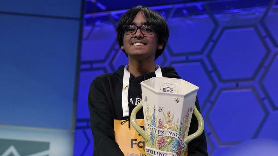 Faizan Zaki, 13, of Dallas, holds the trophy after winning the 2025 Scripps National Spelling Bee at the Gaylord National Resort &amp; Convention Center Thursday, May 29, 2025, in Oxon Hill, Md. (AP Photo/Jose Luis Magana)