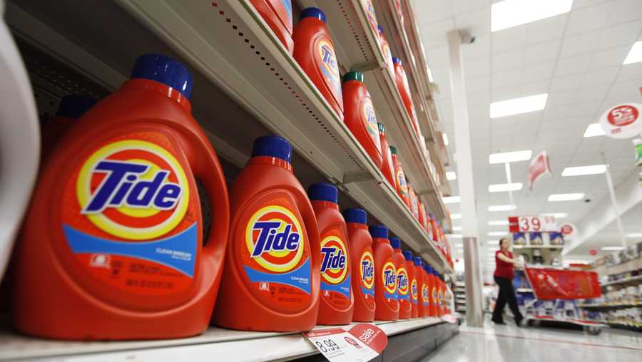 FILE - In this April 27, 2011 file photo, bottles of Procter &amp; Gamble&apos;s Tide detergent are on display at a Target store in Richmond, Va.   (AP Photo/Steve Helber, File)