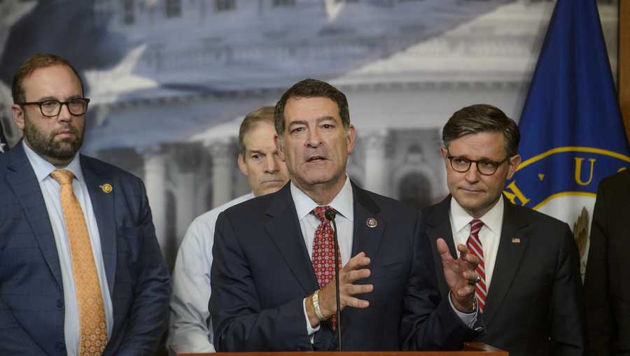 FILE - Rep. Mark Green, R-Tenn., center, is joined by from left: Rep. Jason Smith, R-Mo., Rep. Jim Jordan, R-Ohio, and Speaker of the House Mike Johnson, R-La., right, during a news conference at the Capitol, Tuesday, May 20, 2025, in Washington. (AP Photo/Rod Lamkey, Jr., File)