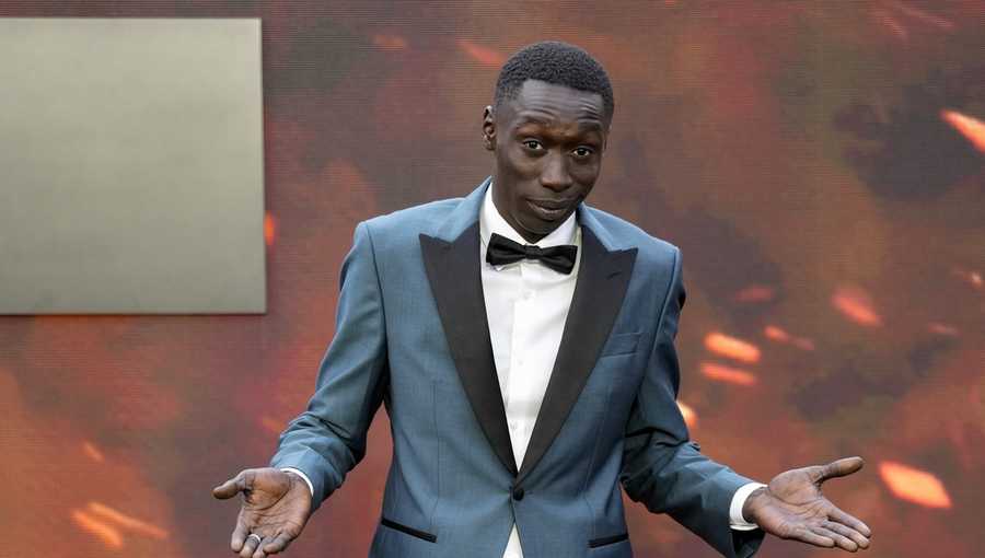 FILE - Khaby Lame poses for photographers upon arrival at the premiere of the film &apos;Oppenheimer&apos; in London, July 13, 2023. (Scott Garfitt/Invision/AP File)