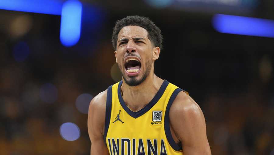 Indiana Pacers guard Tyrese Haliburton reacts after making a three pointer against the Oklahoma City Thunder during the second half of Game 3 of the NBA Finals basketball series, Wednesday, June 11, 2025, in Indianapolis. (AP Photo/Michael Conroy)