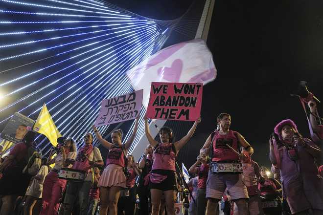 Relatives&#x20;and&#x20;supporters&#x20;of&#x20;Israeli&#x20;hostages&#x20;held&#x20;in&#x20;the&#x20;Gaza&#x20;Strip&#x20;attend&#x20;a&#x20;rally&#x20;demanding&#x20;their&#x20;release&#x20;from&#x20;Hamas&#x20;captivity&#x20;and&#x20;calling&#x20;for&#x20;an&#x20;end&#x20;to&#x20;the&#x20;war,&#x20;in&#x20;Jerusalem,&#x20;Saturday,&#x20;Sept.&#x20;6,&#x20;2025.&#x20;&#x28;AP&#x20;Photo&#x2F;Mahmoud&#x20;Illean&#x29;