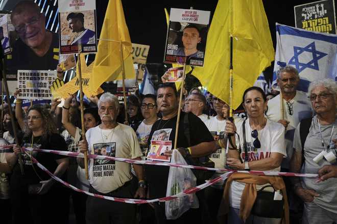 Relatives&#x20;and&#x20;supporters&#x20;of&#x20;Israeli&#x20;hostages&#x20;held&#x20;in&#x20;the&#x20;Gaza&#x20;Strip&#x20;attend&#x20;a&#x20;rally&#x20;demanding&#x20;their&#x20;release&#x20;from&#x20;Hamas&#x20;captivity&#x20;and&#x20;calling&#x20;for&#x20;an&#x20;end&#x20;to&#x20;the&#x20;war,&#x20;in&#x20;Jerusalem,&#x20;Saturday,&#x20;Sept.&#x20;6,&#x20;2025.&#x20;&#x28;AP&#x20;Photo&#x2F;Mahmoud&#x20;Illean&#x29;