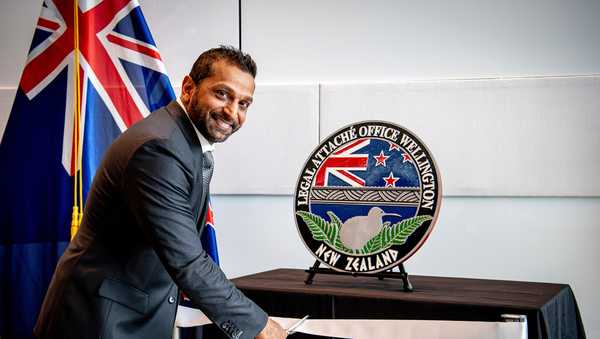 In this photo released by the US Embassy in Wellington, New Zealand, FBI Director Kash Patel cuts the ribbon at the official opening of the FBI office in Wellington, New Zealand, July 31, 2025.