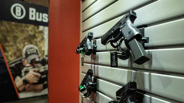 FILE - This photo taken Wednesday, Jan. 22 2020, shows firearms on display at SHOT Show, the annual trade show sponsored by the National Shooting Sports Foundation, in Las Vegas. (AP Photo/Lisa Marie Pane, file)