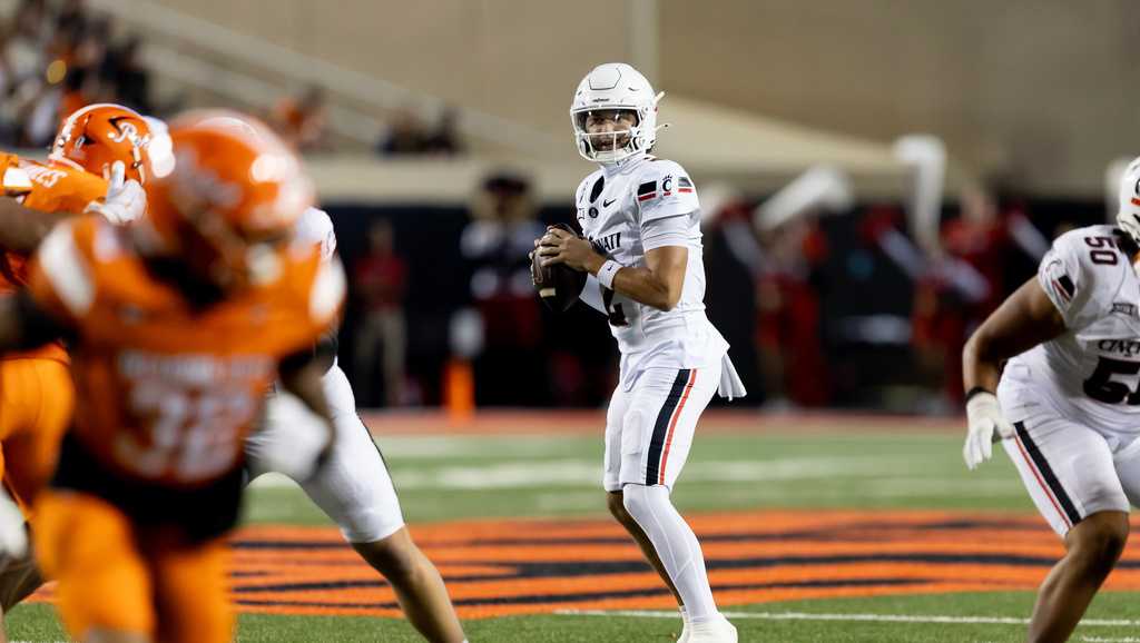 No. 24 Cincinnati bowl eligible after 49-17 victory over Oklahoma State