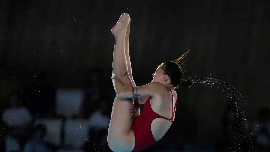 Ukraine condemns Olympic diver's switch to Russia