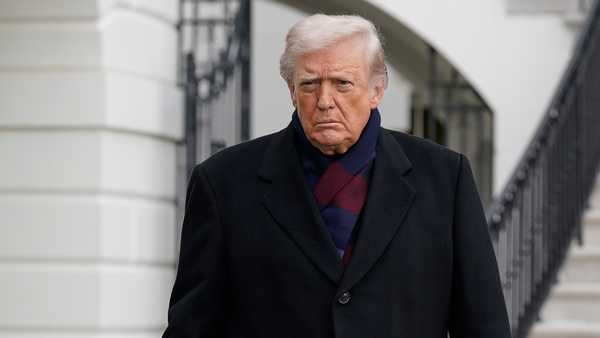 President Donald Trump talks to reporters as he departs from the South Lawn of the White House, Saturday, Dec. 13, 2025, in Washington, en route to Baltimore to attend the Army-Navy football game. (AP Photo/Jose Luis Magana)