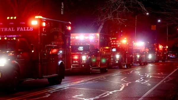 Ambulances line Hope Street at Brown University in Providence, R.I., Saturday, Dec. 13, 2025, during reports of a shooting. (AP Photo/Mark Stockwell)