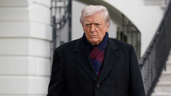 President Donald Trump talks to reporters as he departs from the South Lawn of the White House, Saturday, Dec. 13, 2025, in Washington, en route to Baltimore to attend the Army-Navy football game. (AP Photo/Jose Luis Magana)