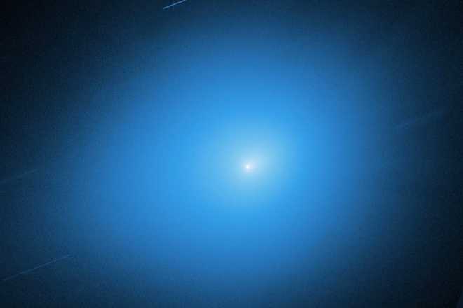 This image, provided by NASA, shows the interstellar comet 3I/Atlas captured by the Hubble Space Telescope on Nov. 30, 2025, about 178 million miles (286 million kilometers) from Earth. (NASA, ESA, STScI, D. Jewitt (UCLA), M.-T. Hui (Shanghai Astronomical Observatory), J. DePasquale (STScI) via AP)