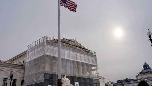 With the Supreme Court Building under renovations, the justices hear oral arguments on President Donald Trump's push to expand control over independent federal agencies, on Capitol Hill in Washington, Monday, Dec. 8, 2025. (AP Photo/J. Scott Applewhite)