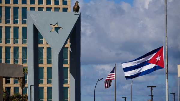The Cuban flag flies at half-mast at the Anti-Imperialist Tribune near the U.S. embassy in Havana, Cuba, Monday, Jan. 5, 2026, in memory of Cubans who died two days before in Caracas, Venezuela during the capture of Venezuelan President Nicolas Maduro by U.S. forces. (AP Photo/Ramon Espinosa)