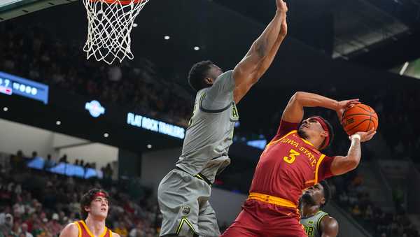 Iowa State guard Tamin Lipsey (3) goes up for a shot against Baylor center Jame Nnaji during the first half of an NCAA college basketball game Wednesday, Jan. 7, 2026, in Waco, Texas. (AP Photo/Julio Cortez)